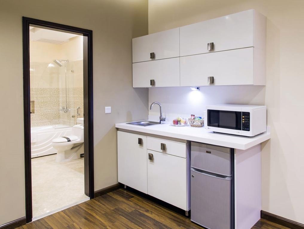 Royaute Luxury Suites And Hotel Gulberg Lahor Oda fotoğraf